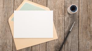 envelope on a wooden desk